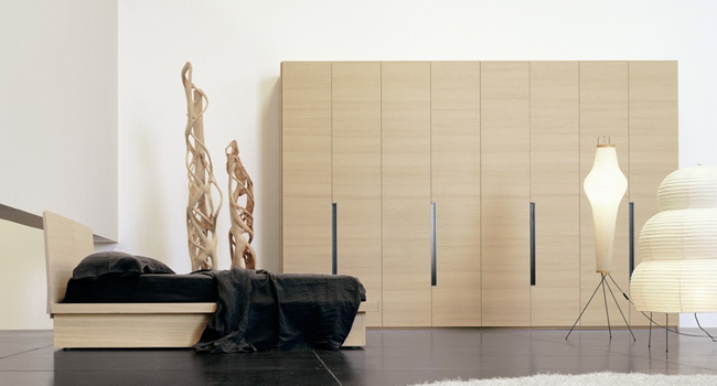 interior design: Swing wardrobe and bed with bleached oak finish