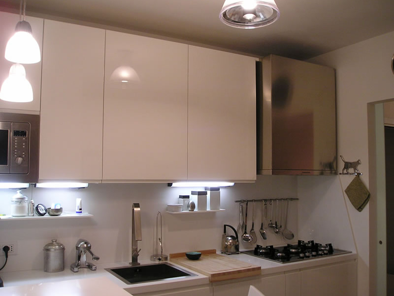 Modern kitchen cabinets, lacquer, with Corian top