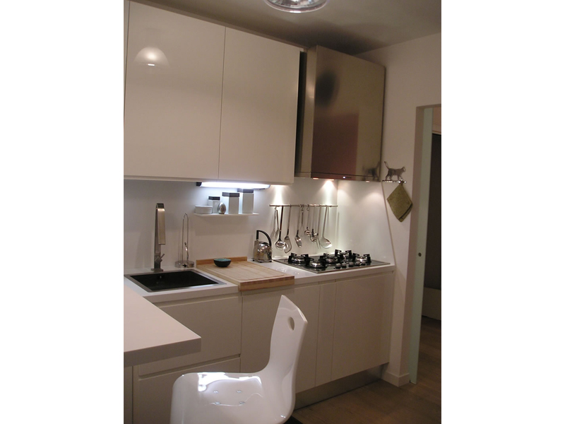 Modern kitchen cabinets, lacquer, with Corian top